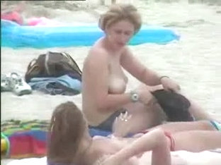 Sexy girls topless at beach - video