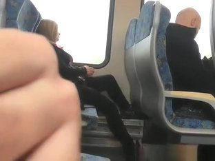 Guy plays with his cock next to female passenger