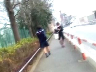 Petite Japanese sweetie is having sharking moment on the way to school