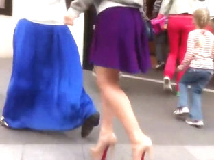 Upskirt look under milf's purple skirt