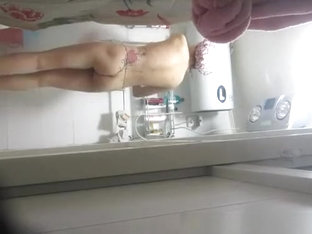 Woman Undressing To Wash Her Tight Body
