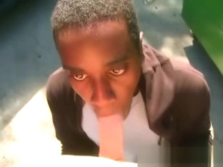 Black gang dude gives white guy head and ass