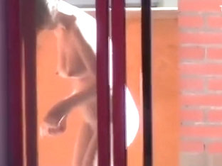Neighbor Spied Through Window Shaving