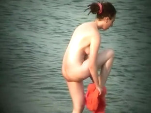 Nude Hippie Woman Getting Out Of Water