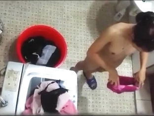 Spying On Thai Neighbor Taking A Bath Outside