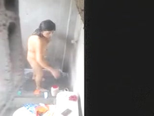 Woman Filmed In Secret While Bathing In A Outdoor Scene
