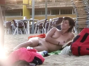 Attractive Italian Woman Sunbathes Completely Naked