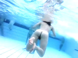 Naked Men And Women In The Pool Filmed Underwater