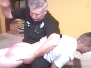 Police officer spanks two naughty boys
