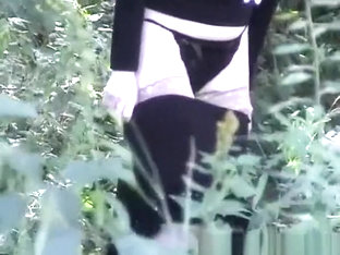 Woman caught changing in the forest