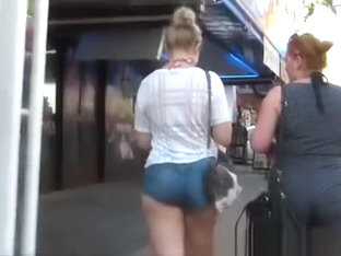 Girl with a bigger ass in tight shorts