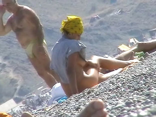 Hot Red Hair Babe Takes A Nude Sunbath At The Beach