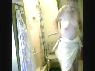 My 74years old granny caught nude after shower. Hidden cam