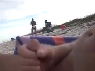 Horny Daddy Pisses And Jerks Off His Penis On A Black Babe At The Beach