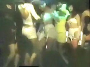 Vintage night club dancing with scantily clad girls