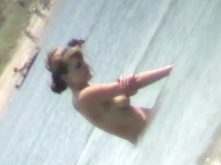 Nudist video at the beach done by a horny voyeur