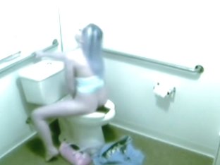 Unaware Girl Got Caught On Camera Fingering On A Toilet