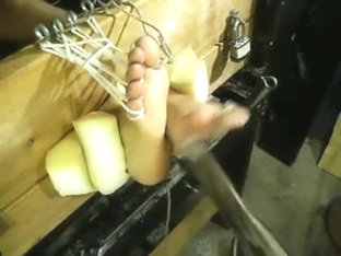 Male Feet In Stocks and Tickled