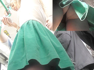 Spy upskirt cam got under the young chick's green skirt