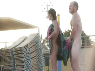 Attractive naked people on the street side nude beach tease each other