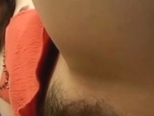 Hairy Japanese slut gets a dildo up her twat