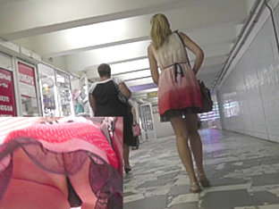 Hot blonde upskirt video filmed in the public place