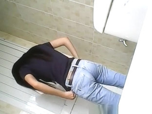 Hidden toilet camera catches asian woman pissing