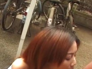 Asian amateur gives outdoor blowjob