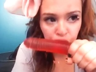 Hot redhead sucks dildo on webcam