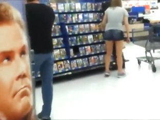 Young Chick Bends Over To Pick A Movie