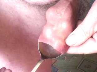 Four rubber balls and four spoons in foreskin