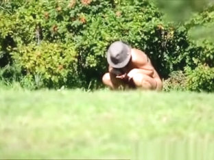 Peeing In The Bushes In The Meadow