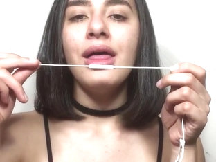 Girl licking a microphone