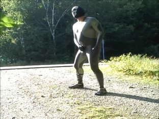 skeleton masked wetsuit on the road