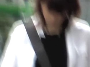 White Shirt On And Brown Skirt Sharking While Slowly Pacing