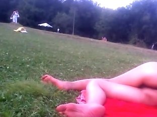 Girl In Tiniest Bikini Getting Sun Tanned In The Field Pict0011
