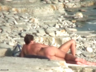 Hot Cougar Is Lying On Sand In Naked Beach Video