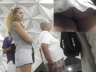 While Train Is Coming, Voyeur Captures Upskirt Ass