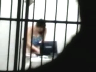 Sexy Brunette Masterbates In A Cell Behind Bars While On Her Laptop Porn