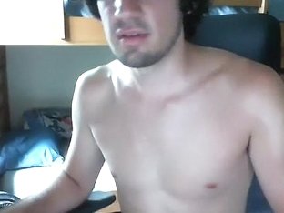Alluring boy is jerking in the guest room and filming himself on webcam