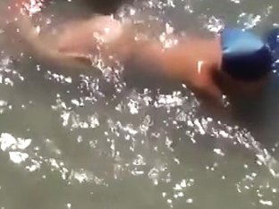 Voyeur Busts Nudists In The Sea. That Blowjob Tasted Salty For Sure !!!