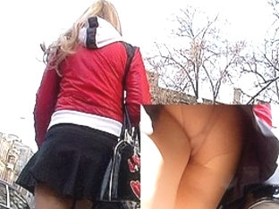 Delightsome upskirt gal clothed in dark