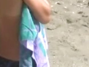 Slender legal age teenager with merry bumpers stripped at a nudist beach