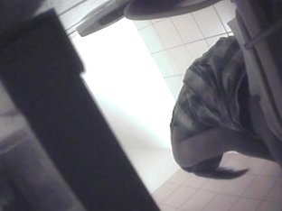 Sexy Wench In A Dress Exposing Her Ass On Toilet Camera