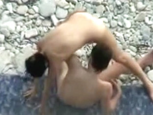 Cute Juvenile In Nature's Garb Pair Caught Banging At The Beach