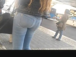 Long hair teen in tight jeans pants