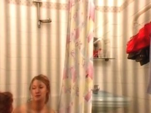 Guy tapes 2 girls naked in the bathroom