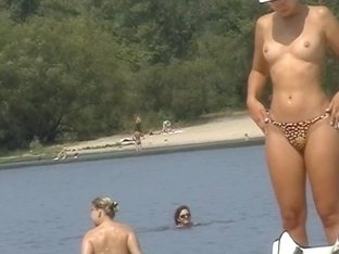 Topless Girls Sunbathing On A Nudist Beach On Cam