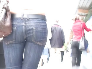 A horny voyeur follows a hot bitch in tight jeans and heels