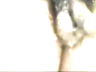 Two muscular marines take a long shower.